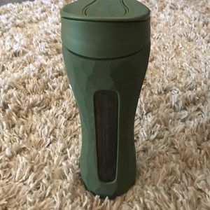 Glass and army green water bottle